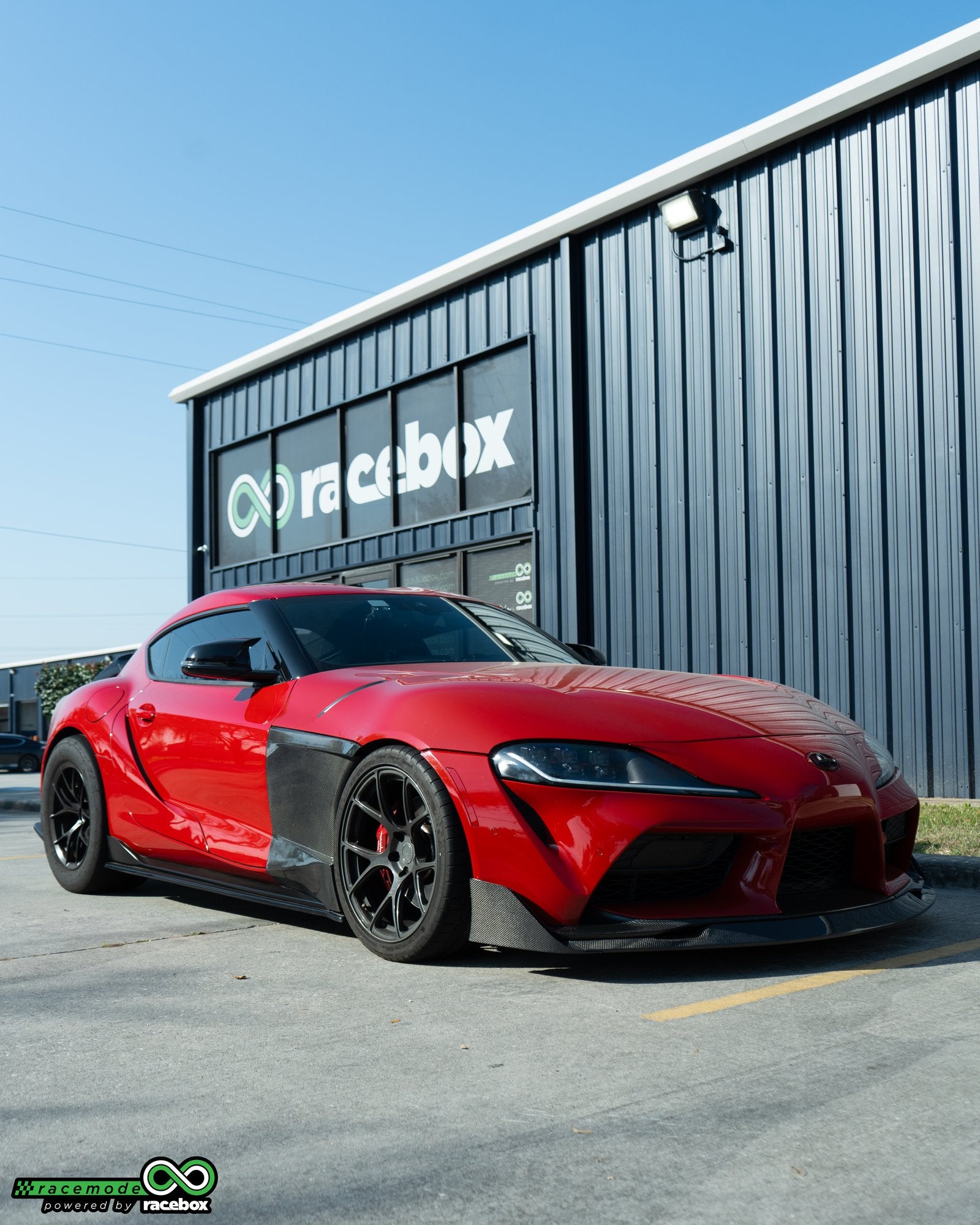 Red Toyota GR Supra B58 outside Racebox shop Houston TX