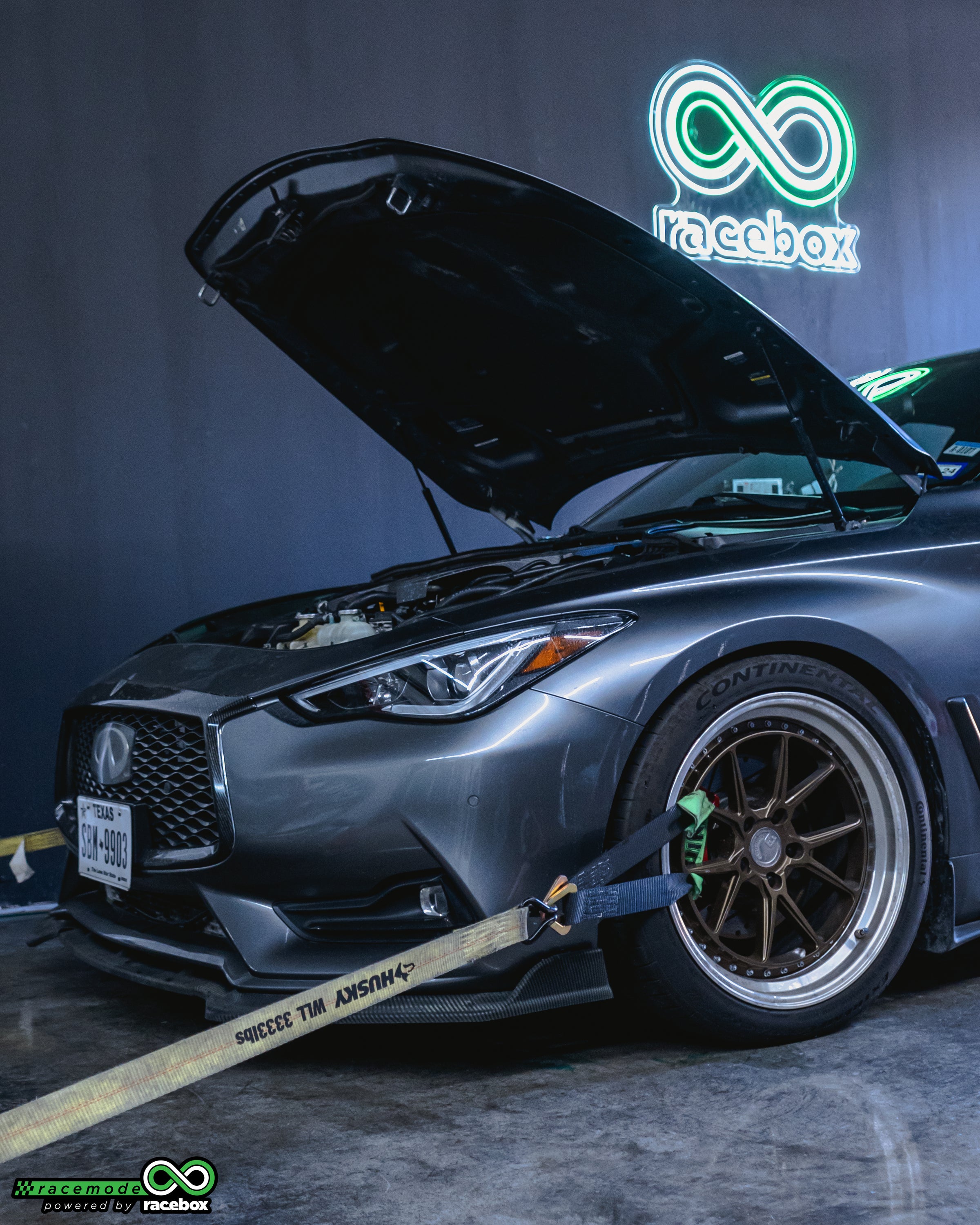 Infiniti Q60 VR30 FBO build with hood up on the dyno at Racebox